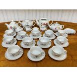 Two Children's China Tea Sets, comprising tea pots, milk jugs, sugar bowls, cups and saucers, in