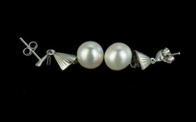 White Cultured Pearl Drop Earrings of elegant design, each large, ( approximately 10mm wide ),