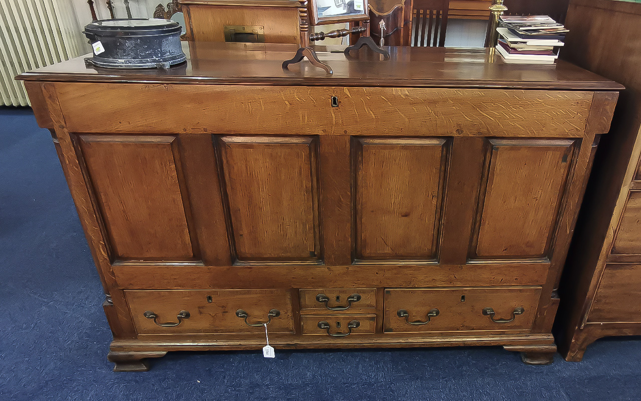 18th Century Mule Chest, lift up lid storage over two large and two small drawers. Panelled front.