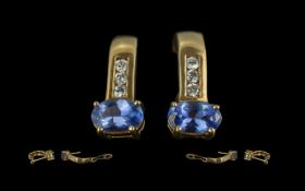 Ladies 18ct Gold - Fine Quality Pair of Diamond and Tanzanite Set Earrings. Marked 18ct. The
