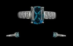 Ladies 9ct White Gold Attractive Blue Topaz and Diamond Set Ring. Full Hallmark to Interior of
