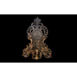 Early 20th Century Ormolu Clock, decorative dragon head and floral pattern.