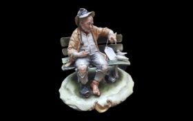Capodimonte 'Tramp on Bench' signed B Marli, depicts a tramp on a bench feeding to doves.
