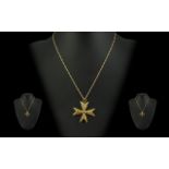 18ct Gold Stylised Openwork Cross - Attached To An 18ct Gold Fancy Chain.