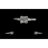 18ct White Gold - Contemporary 4 Stone Diamond Set Ring. Full Hallmark to Interior of Shank. The 4
