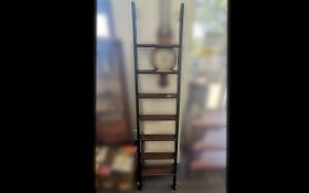 Mahogany Library Ladder, seven rungs, measures 75" tall. Lovely decorative and useful piece.