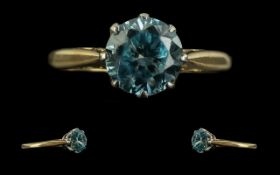 18ct Gold Excellent Quality Single Blue Zircon Set Dress Ring, marked 18ct to interior of shank.