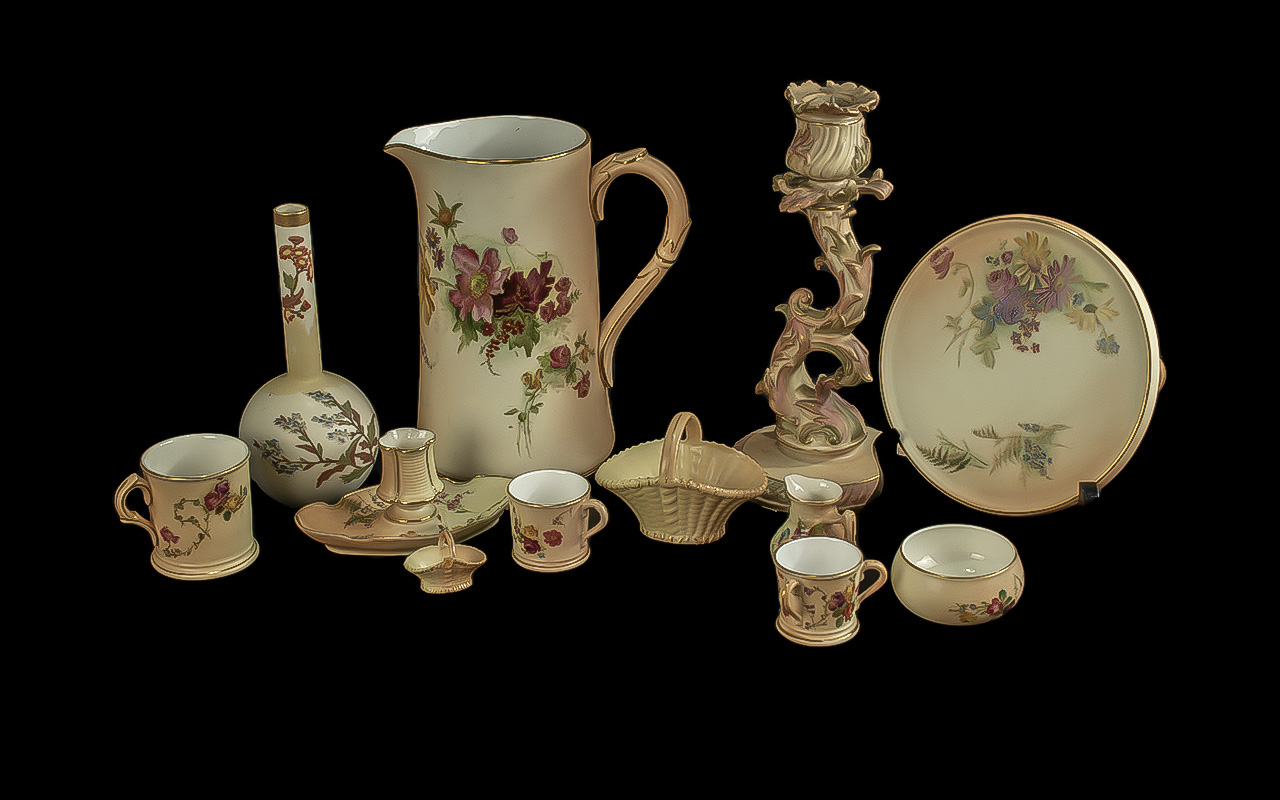 Collection of Royal Worcester Blush Ivory, comprising a 7.5" jug, a candlestick in floral form No.