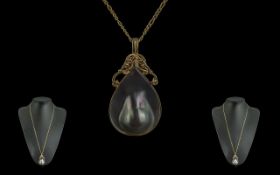 A Contemporary Designed 14ct Gold Diamond and Blister Pearl Set Large Pendant,