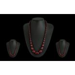 A Fine Quality 1920's Graduated Cherry Amber Beaded Necklace of Excellent Colour / Grain.