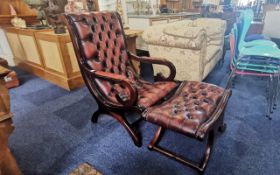 Oxblood Leather Button Back Chair & Matching Foot Stool, mahogany arms with leather arm rests,