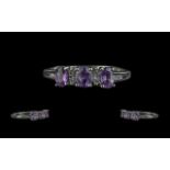 Ladies Amethyst and Diamond Set Ring In 9ct White Gold. Amethyst 3 Stone Ring with Diamond Spacers