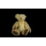 Light Golden Brown Teddy Bear, possibly 1950s Steiff, with a distinctive head shape and brown