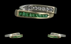 Ladies 18ct White Gold Contemporary Designed Emerald and Diamond Set Dress Ring.