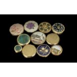 A collection of 11 vintage powder compacts,