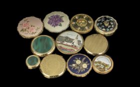 A collection of 11 vintage powder compacts,