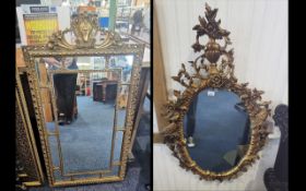 Two Decorative Mirrors, one an oval Rococo design gilt framed mirror, measures approx.