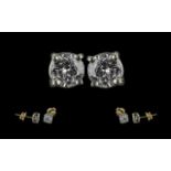 A Fine Pair of 18ct Gold Single Stone Diamond Stud Earrings. Marked 750 - 18ct.