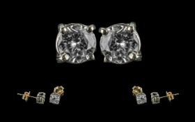 A Fine Pair of 18ct Gold Single Stone Diamond Stud Earrings. Marked 750 - 18ct.