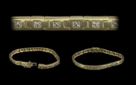 9ct Yellow Gold - Diamond Set Line Bracelet. Diamond Weight 0.