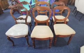 Six Balloon Back Dining Chairs, four with heart shaped backs cream upholstery and turned legs,