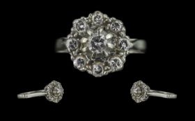 18ct White Gold Diamond Set Cluster Ring - Flowerhead Design. Marked 18ct To Interior Of Shank.
