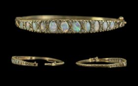 Antique Period - Attractive 18ct Gold Opal and Diamond Set Hinged Bangle.