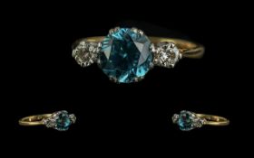 18ct Gold - Attractive 3 Stone Diamond and Blue Zircon Set Ring. Marked 18ct to Interior of Shank.