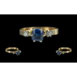 Ladies 18ct Gold Attractive 3 Stone Sapphire and Diamond Set Ring. Marked 18ct to Shank. The Blue