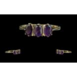 9ct Gold Amethyst 3 Stone Ring. Amethyst Set Ladies Ring In 9ct Yellow Gold, Good Design and Quality