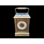 French Carriage Clock with repeating mechanism, cream chapter dial with Arabic numerals,