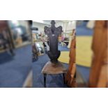Early 20th Century Carved Oak Hall Chair, shaped shield back, turned supports, height 50",