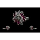 14ct White Gold Attractive Diamond & Ruby Set Dress Ring, marked 14ct to shank.