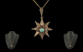 A Fine 9ct Gold Star-burst Pendant - Brooch, Set with Turquoise and Sapphire, Marked 9ct.