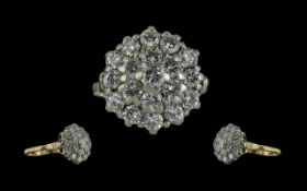 18ct Gold and Platinum Diamond Set Cluster Ring. Marked 18ct to Interior of Shank. Flower head