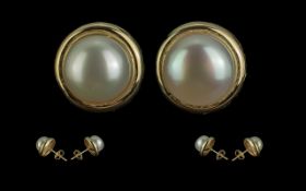 Ladies Attractive Pair of 18ct Gold and Pearl Earrings. The Two Pearls of Excellent Lustre. Boxed.