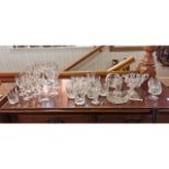 Box of Assorted Glassware, including 12 champagne flutes, 12 whisky tumblers, two vases, a clock,