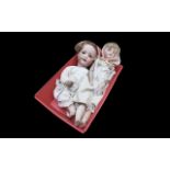 Two Antique Dolls,