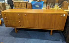 **WITHDRAWN** Long Teak Sideboard with pull down front with interior shelving, the other side