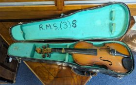 A Child's Violin in a Fitted Case. Length approx. 20''. As found condition.