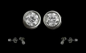 18ct White Gold Diamond Set Stud Earrings. Marked 750. The Pave Set Diamonds of Good Colour /