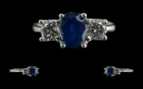 Ladies 18ct White Gold 3 Stone Sapphire and Diamond Set Ring. Full Hallmark to Interior of Shank.