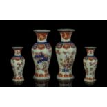 A Pair of Portuguese Ceramic Vases Vista Alegre decorated in an Oriental style. Each vase