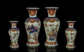 A Pair of Portuguese Ceramic Vases Vista Alegre decorated in an Oriental style. Each vase
