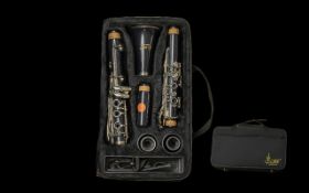 Slade Student Clarinet in fitted case, made in USA, in black fabric fitted case.