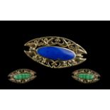 A Good Quality & Pleasing two stone reversing 9ct Gold Swivel Brooch, set with malachite and Lapis