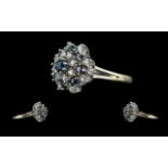 18ct White Gold Attractive Blue Sapphire & Diamond Set Dress Ring, flowerhead setting. Full hallmark