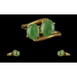 22ct Gold Superior Quality Two Stone Jade Set Ring. Marked 916 to interior of shank. Jade stones