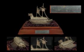 An Oriental Silver Model of a Ship. This is a model of The World First Iron Clad Warship invented by