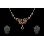 German Vintage Attractive 8ct Gold Ornate Garnet Set Necklace, marked 333 - 8ct. The faceted garnets